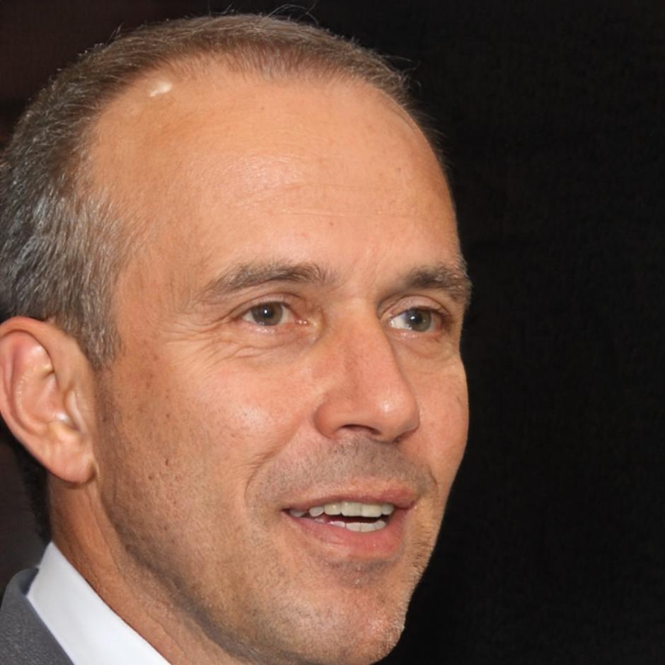 Professional headshot of male team member